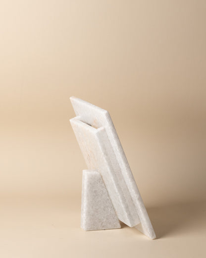White marble picture frame on a beige background