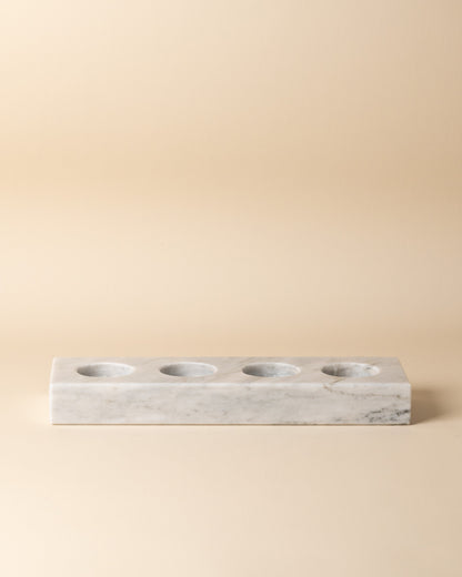 Marble rectangular candle holder on a beige background